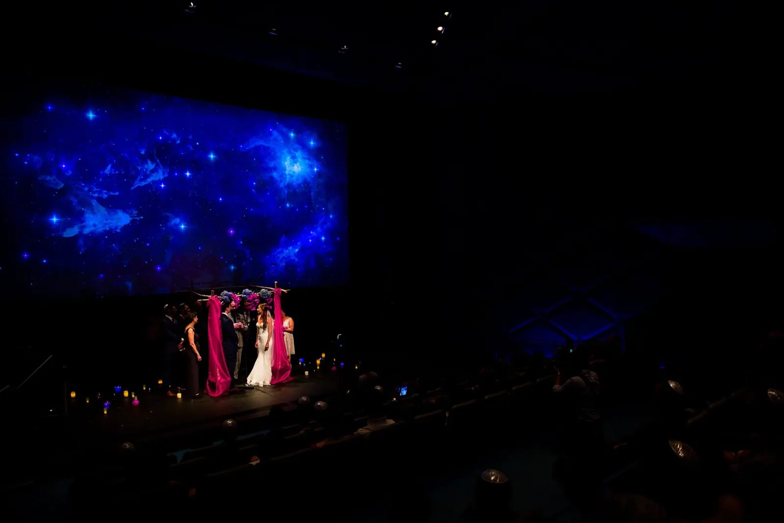 jewish wedding couple inside the museum of moving image for their ceremony